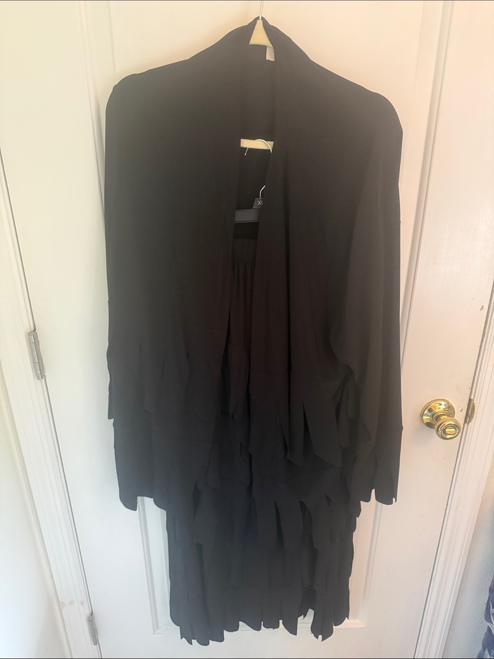 Women’s 2 pc Black Flowing Fringe Hem Top Cardigan along with fringe skirt. 3X
